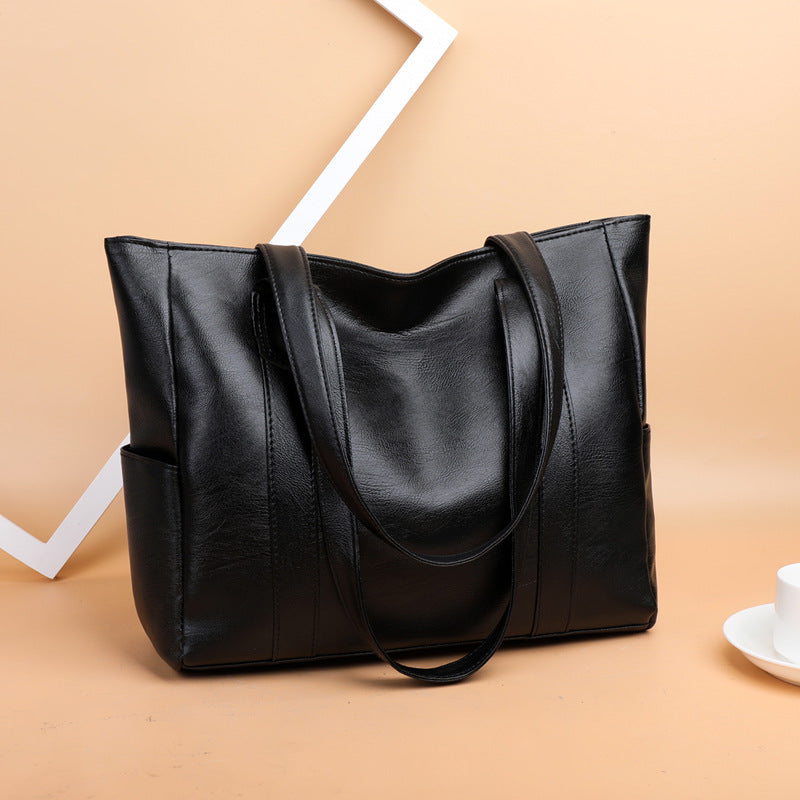 ✨👜【Reducere 50%】【Capacitate mare】Geantă de umăr pentru femei din piele moale, nouă din 2025.