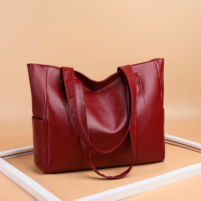 ✨👜【Reducere 50%】【Capacitate mare】Geantă de umăr pentru femei din piele moale, nouă din 2025.