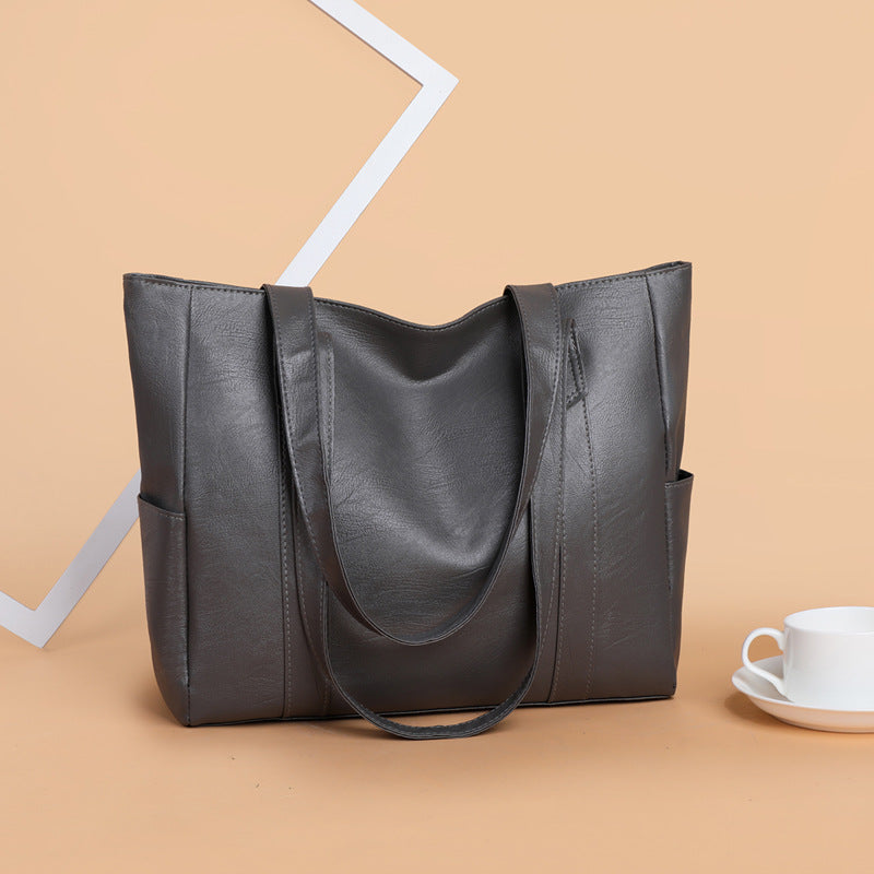 ✨👜【Reducere 50%】【Capacitate mare】Geantă de umăr pentru femei din piele moale, nouă din 2025.