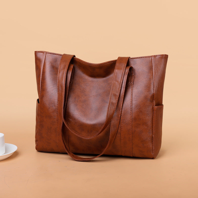 ✨👜【Reducere 50%】【Capacitate mare】Geantă de umăr pentru femei din piele moale, nouă din 2025.