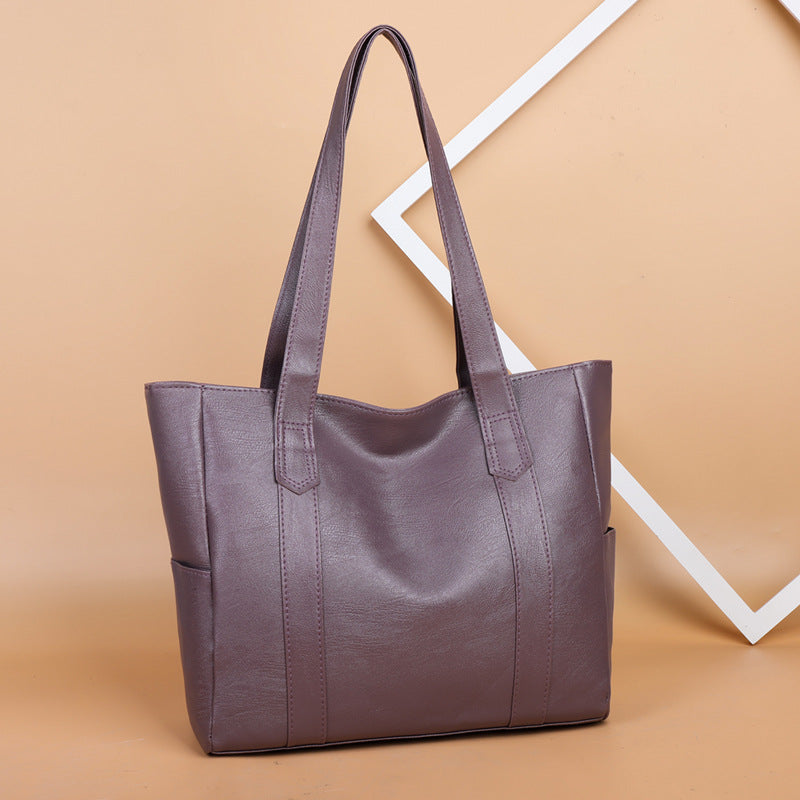 ✨👜【Reducere 50%】【Capacitate mare】Geantă de umăr pentru femei din piele moale, nouă din 2025.