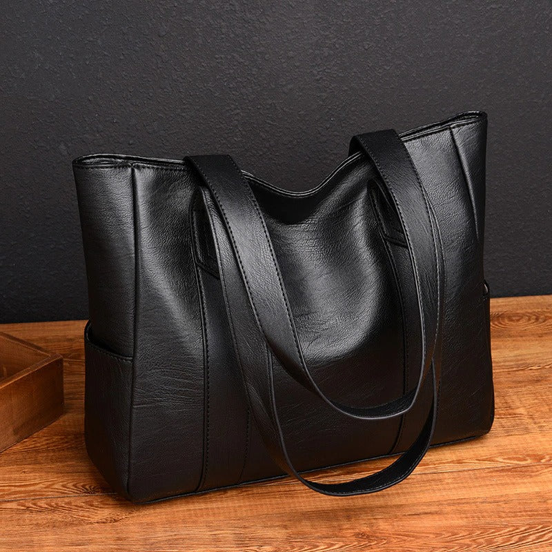 ✨👜【Reducere 50%】【Capacitate mare】Geantă de umăr pentru femei din piele moale, nouă din 2025.