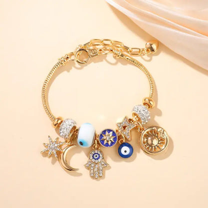 Pulsera de mujer con diseño de cielo estrellado | Luna, mano de Hamsa, ojo turco y árbol de la vida