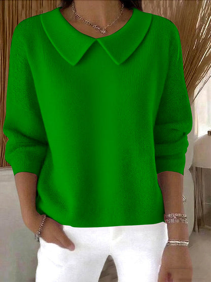 Cómoda camiseta de manga larga con cuello en V para otoño e invierno.