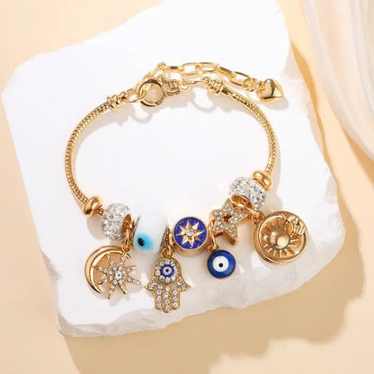 Pulsera de mujer con diseño de cielo estrellado | Luna, mano de Hamsa, ojo turco y árbol de la vida