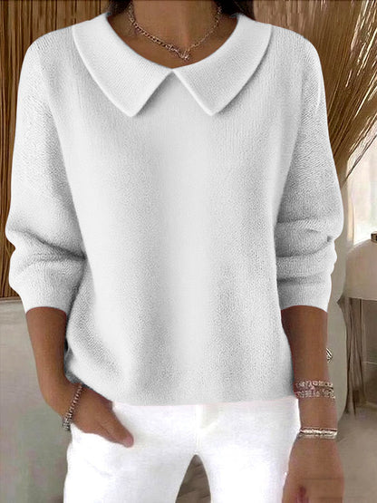 Cómoda camiseta de manga larga con cuello en V para otoño e invierno.